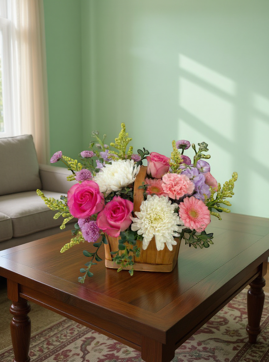 Lakewood Florist Dreamy Garden spring flower basket with pink roses, white chrysanthemums, pink gerberas, and purple stock.